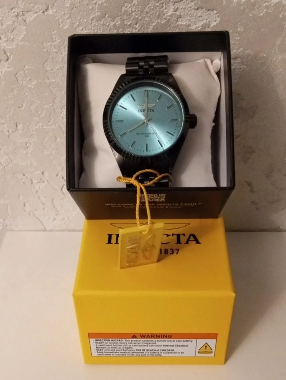 Invicta Black Watch with Teal Dial